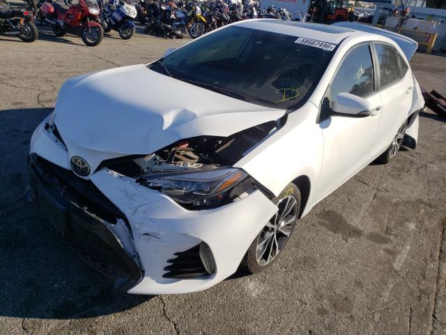 Photo 1 VIN: 5YFBURHE1HP602361 - TOYOTA COROLLA L 