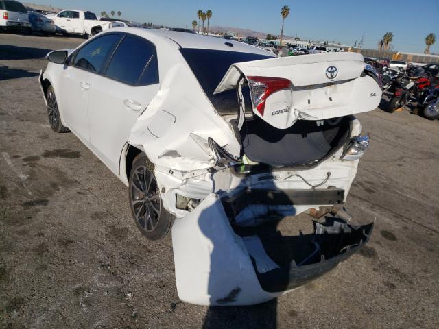 Photo 2 VIN: 5YFBURHE1HP602361 - TOYOTA COROLLA L 