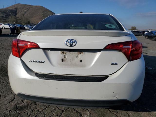 Photo 5 VIN: 5YFBURHE1HP606961 - TOYOTA COROLLA 