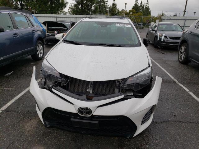 Photo 4 VIN: 5YFBURHE1HP615255 - TOYOTA COROLLA L 