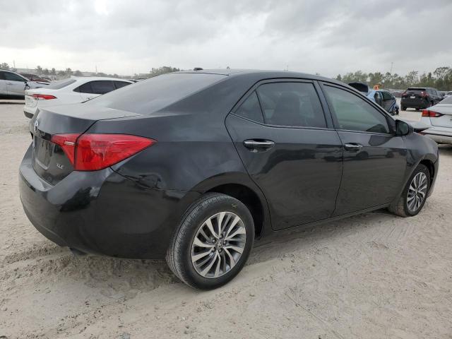 Photo 2 VIN: 5YFBURHE1HP615580 - TOYOTA COROLLA L 