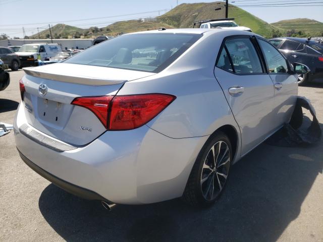 Photo 3 VIN: 5YFBURHE1HP658915 - TOYOTA COROLLA L 