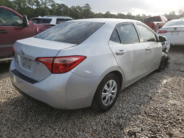 Photo 3 VIN: 5YFBURHE1HP662530 - TOYOTA COROLLA L 