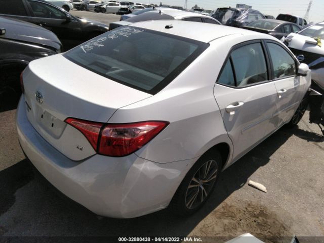 Photo 3 VIN: 5YFBURHE1HP692384 - TOYOTA COROLLA 