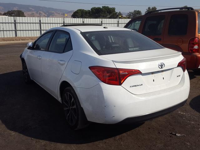 Photo 2 VIN: 5YFBURHE1HP692983 - TOYOTA COROLLA L 