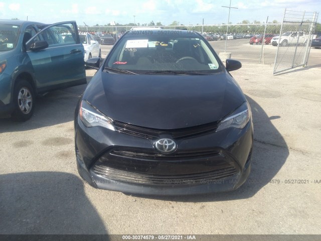 Photo 5 VIN: 5YFBURHE1HP695818 - TOYOTA COROLLA 