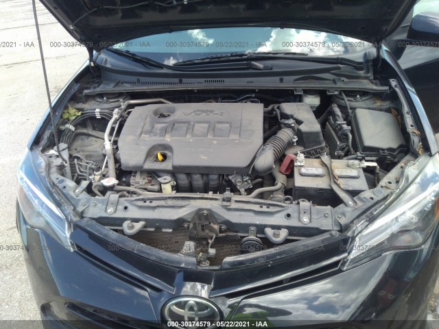 Photo 9 VIN: 5YFBURHE1HP695818 - TOYOTA COROLLA 