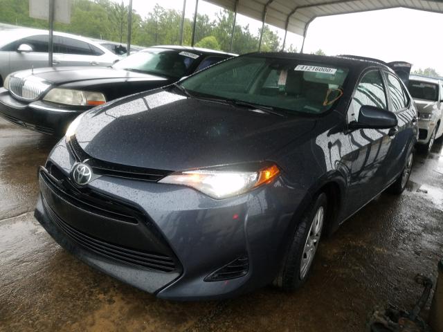 Photo 1 VIN: 5YFBURHE1HP698864 - TOYOTA COROLLA L 