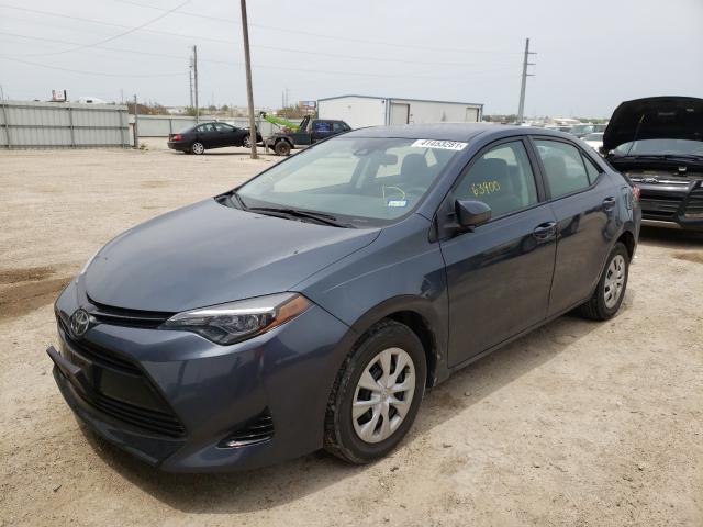 Photo 1 VIN: 5YFBURHE1HP705599 - TOYOTA COROLLA L 