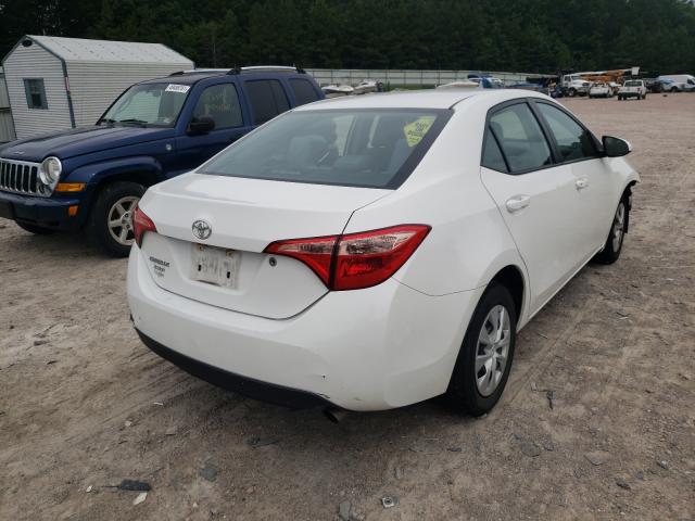 Photo 3 VIN: 5YFBURHE1HP718644 - TOYOTA COROLLA L 