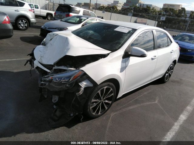 Photo 1 VIN: 5YFBURHE1JP773133 - TOYOTA COROLLA 