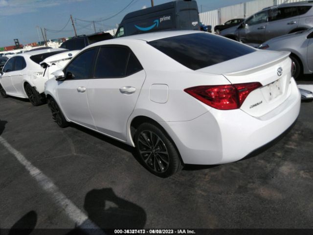 Photo 2 VIN: 5YFBURHE1JP773133 - TOYOTA COROLLA 