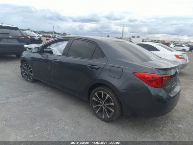 Photo 2 VIN: 5YFBURHE1JP791695 - TOYOTA COROLLA 