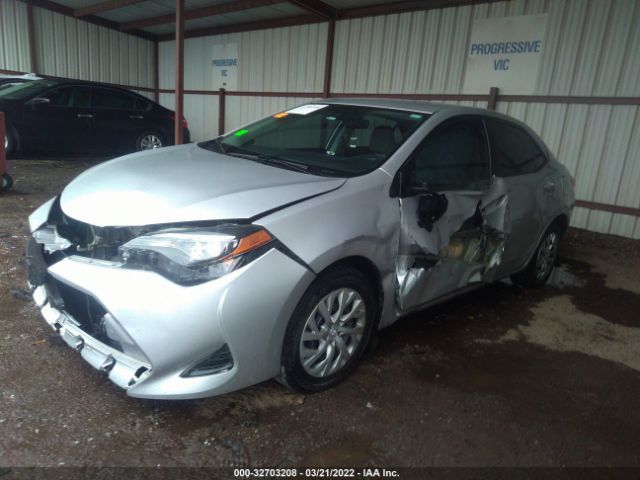 Photo 5 VIN: 5YFBURHE1JP795097 - TOYOTA COROLLA 