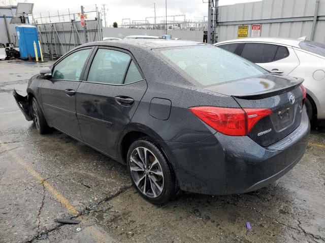 Photo 1 VIN: 5YFBURHE1JP797030 - TOYOTA COROLLA L 