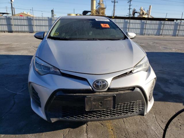 Photo 4 VIN: 5YFBURHE1JP798839 - TOYOTA COROLLA L 