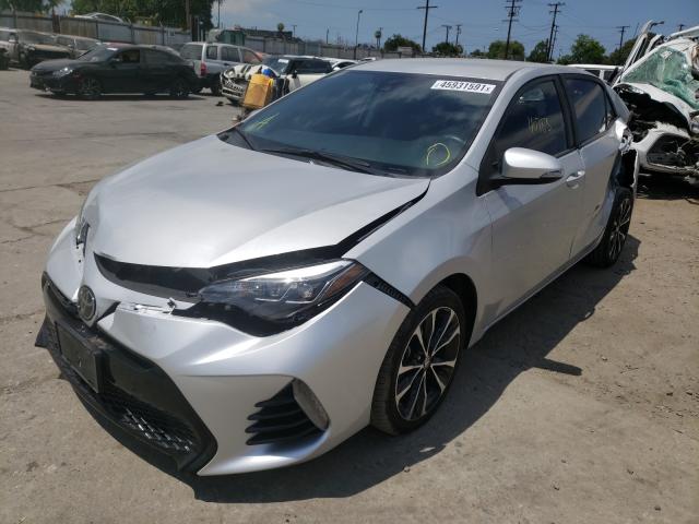 Photo 1 VIN: 5YFBURHE1JP805966 - TOYOTA COROLLA L 