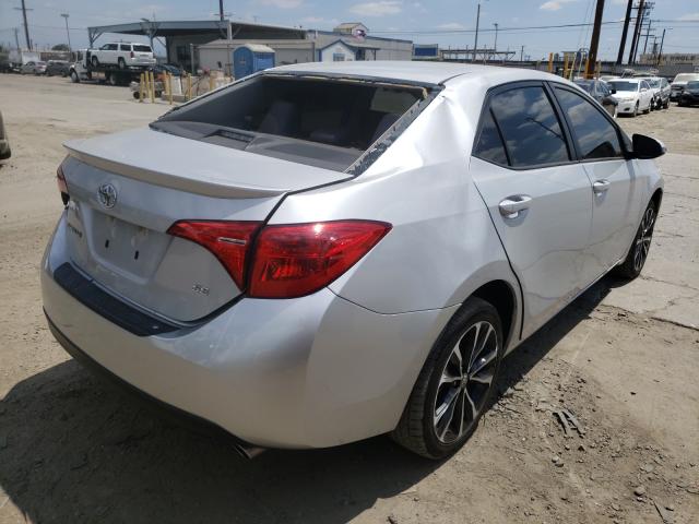 Photo 3 VIN: 5YFBURHE1JP805966 - TOYOTA COROLLA L 