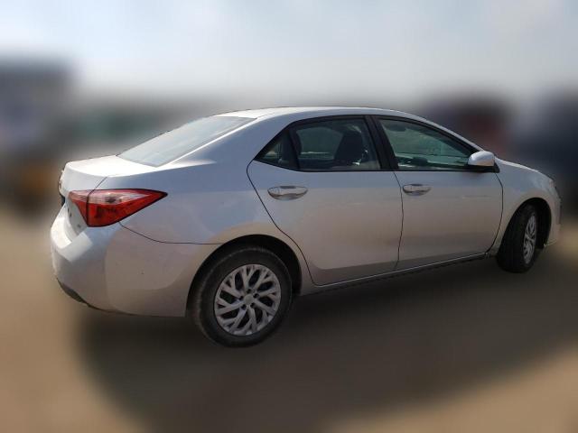 Photo 2 VIN: 5YFBURHE1JP811010 - TOYOTA COROLLA 