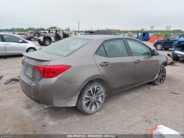 Photo 3 VIN: 5YFBURHE1JP812707 - TOYOTA COROLLA 