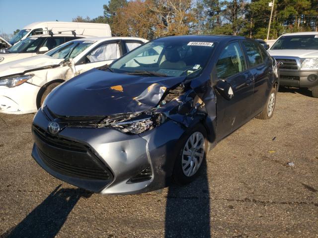 Photo 1 VIN: 5YFBURHE1JP813677 - TOYOTA COROLLA L 