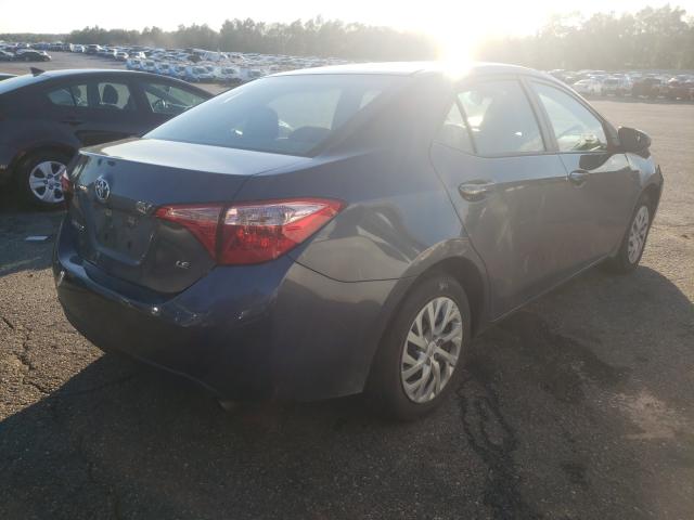 Photo 3 VIN: 5YFBURHE1JP813677 - TOYOTA COROLLA L 