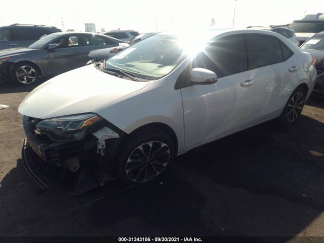 Photo 1 VIN: 5YFBURHE1JP818412 - TOYOTA COROLLA 