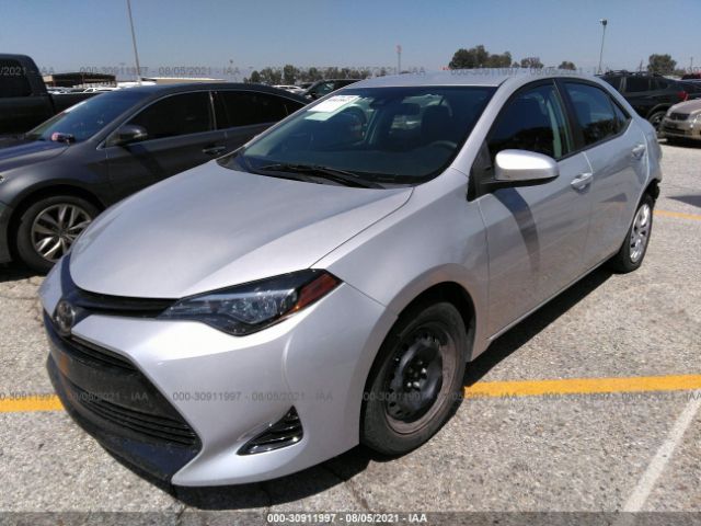 Photo 1 VIN: 5YFBURHE1JP818636 - TOYOTA COROLLA 