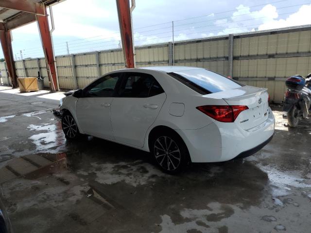 Photo 1 VIN: 5YFBURHE1JP822363 - TOYOTA COROLLA L 