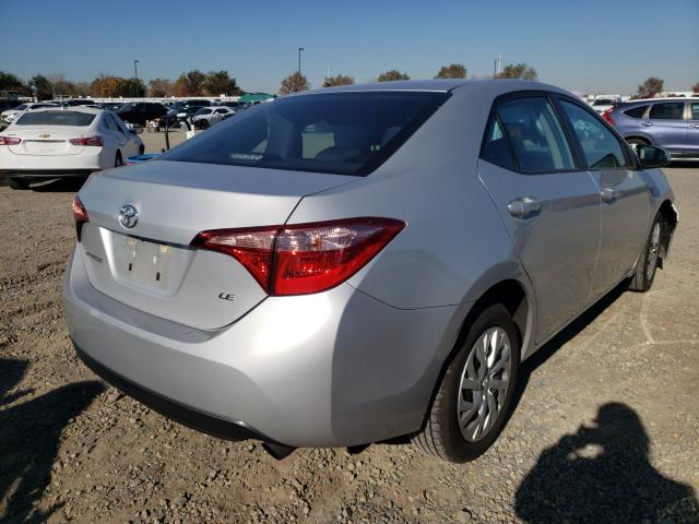 Photo 3 VIN: 5YFBURHE1JP844718 - TOYOTA COROLLA L 