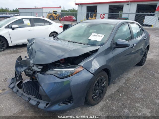 Photo 1 VIN: 5YFBURHE1JP847506 - TOYOTA COROLLA 