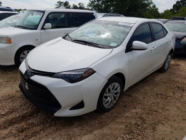 Photo 1 VIN: 5YFBURHE1JP854679 - TOYOTA COROLLA L 