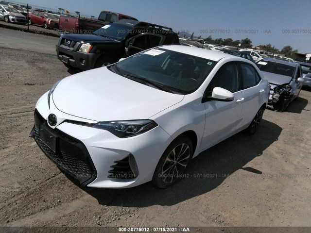 Photo 1 VIN: 5YFBURHE1KP856692 - TOYOTA COROLLA 