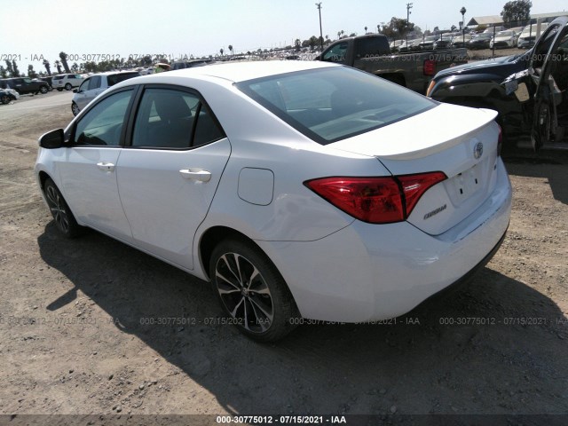 Photo 2 VIN: 5YFBURHE1KP856692 - TOYOTA COROLLA 