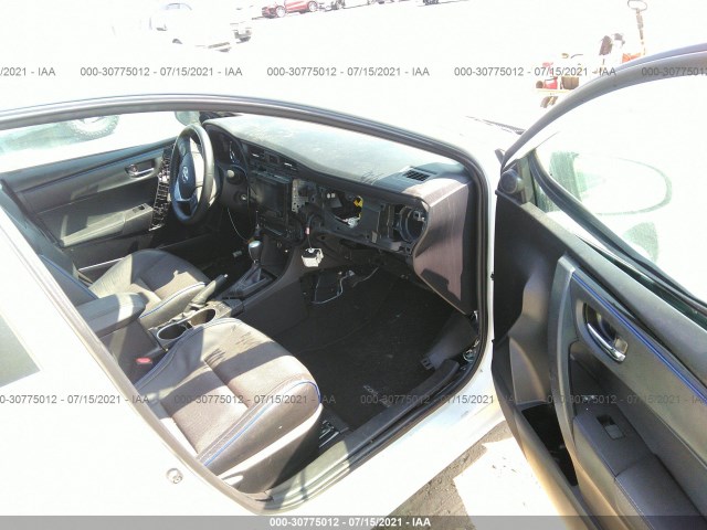 Photo 4 VIN: 5YFBURHE1KP856692 - TOYOTA COROLLA 