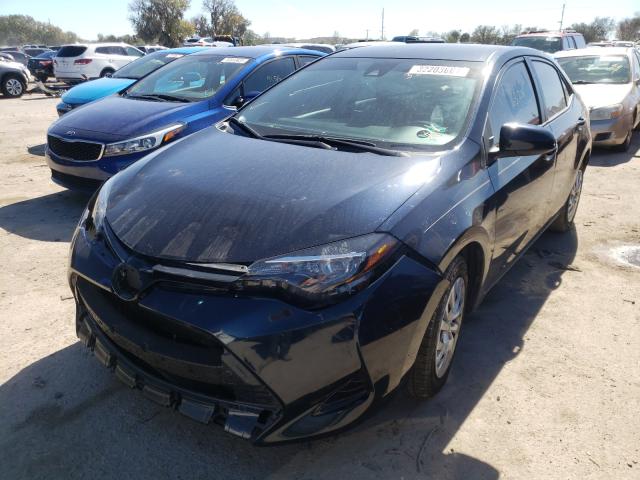 Photo 1 VIN: 5YFBURHE1KP857079 - TOYOTA COROLLA L 