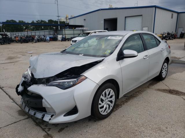 Photo 1 VIN: 5YFBURHE1KP859396 - TOYOTA COROLLA L 