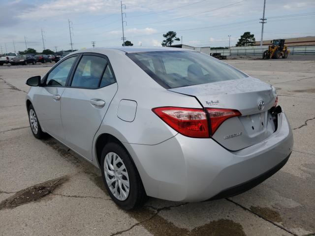 Photo 2 VIN: 5YFBURHE1KP859396 - TOYOTA COROLLA L 