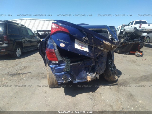 Photo 5 VIN: 5YFBURHE1KP859995 - TOYOTA COROLLA 