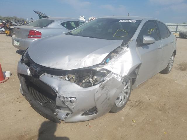 Photo 1 VIN: 5YFBURHE1KP861147 - TOYOTA COROLLA L 