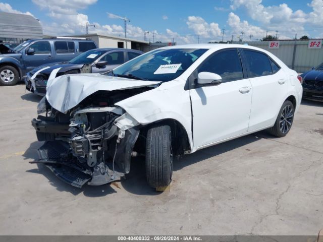 Photo 1 VIN: 5YFBURHE1KP863187 - TOYOTA COROLLA 