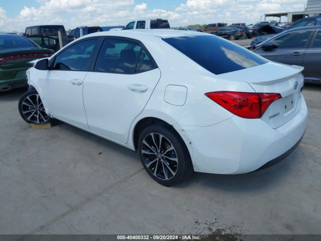 Photo 2 VIN: 5YFBURHE1KP863187 - TOYOTA COROLLA 