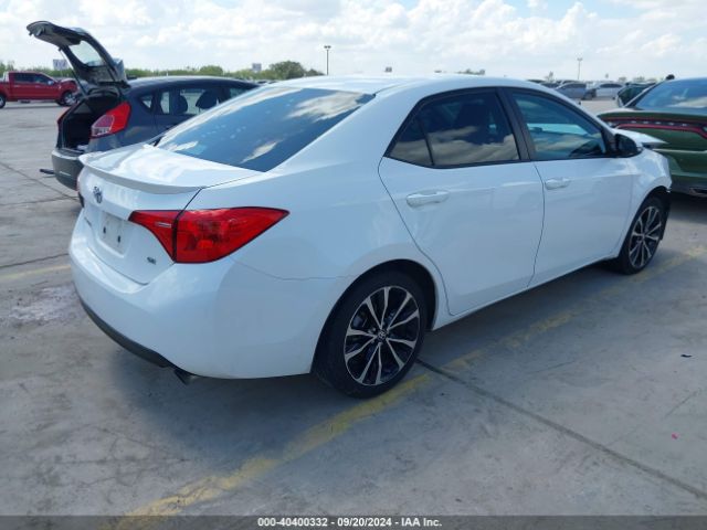 Photo 3 VIN: 5YFBURHE1KP863187 - TOYOTA COROLLA 