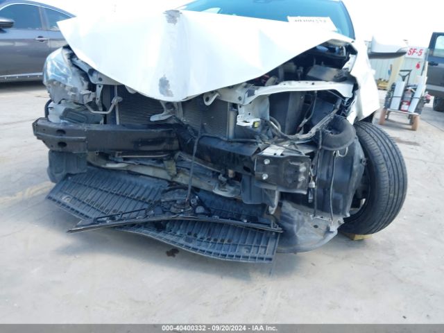 Photo 5 VIN: 5YFBURHE1KP863187 - TOYOTA COROLLA 