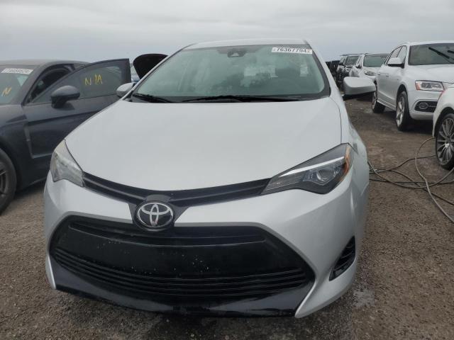 Photo 4 VIN: 5YFBURHE1KP866073 - TOYOTA COROLLA L 