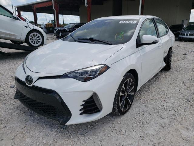 Photo 1 VIN: 5YFBURHE1KP866946 - TOYOTA COROLLA L 