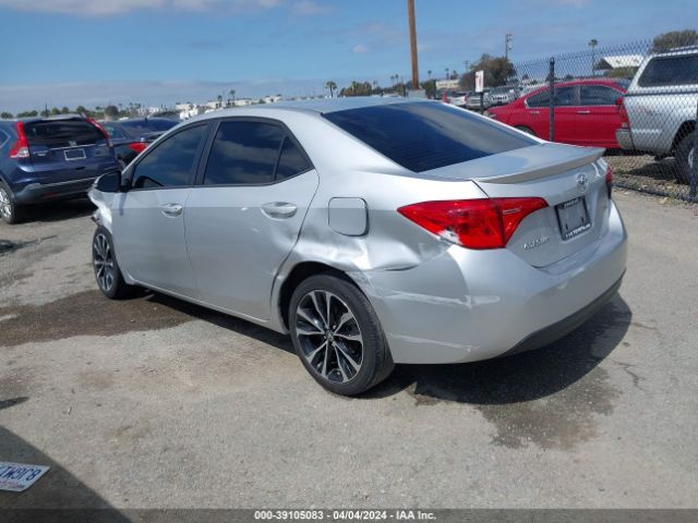 Photo 2 VIN: 5YFBURHE1KP867255 - TOYOTA COROLLA 