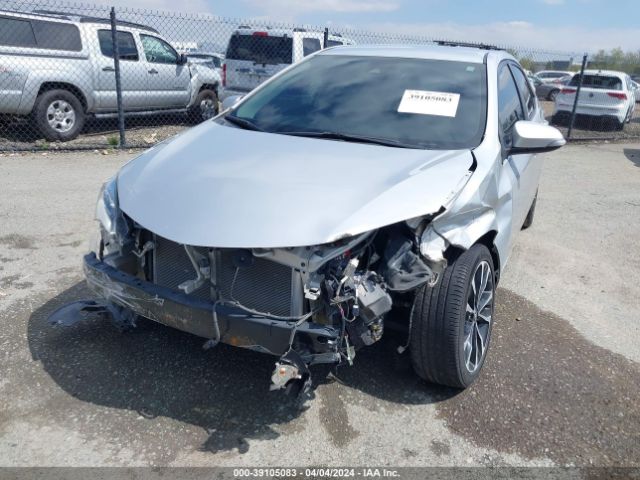 Photo 5 VIN: 5YFBURHE1KP867255 - TOYOTA COROLLA 