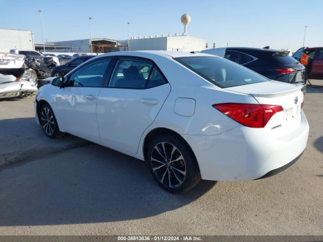 Photo 2 VIN: 5YFBURHE1KP867532 - TOYOTA COROLLA 