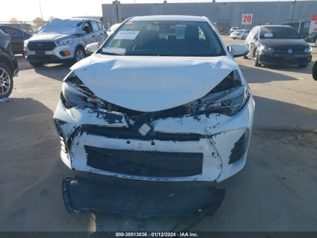 Photo 5 VIN: 5YFBURHE1KP867532 - TOYOTA COROLLA 